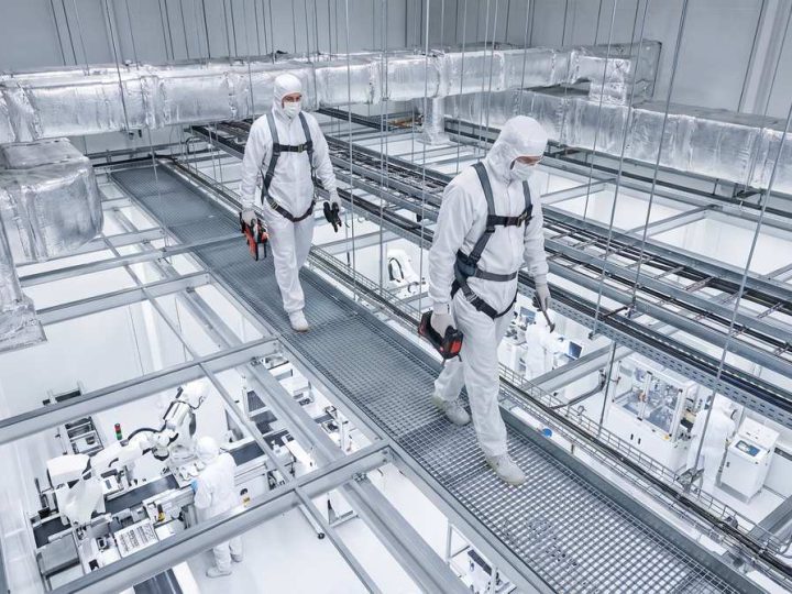Technicians_servicing_utilities_for ceiling of clean room